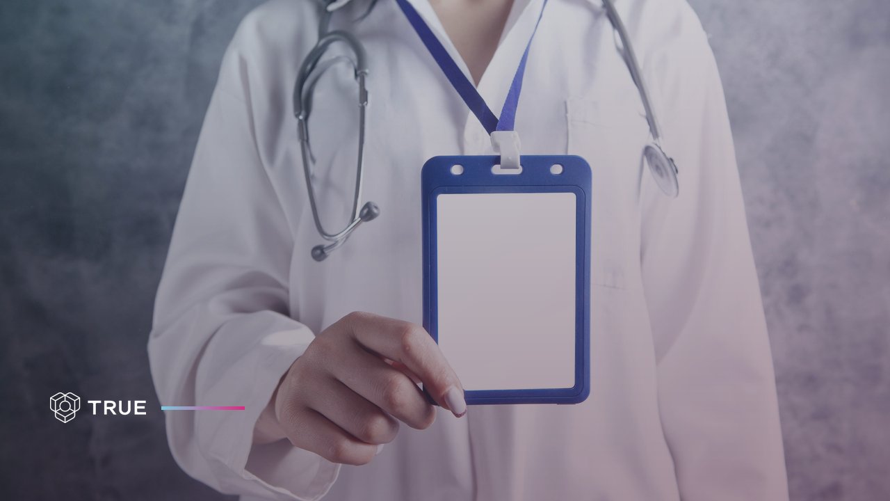 Doctor holding a blank ID badge on a lanyard, illustrating why PDFs fail as professional licenses